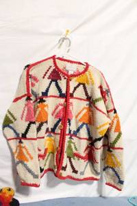 lot 288 image: Express Tricot Handknitted Wool Sweater with Colorful Figures Pattern