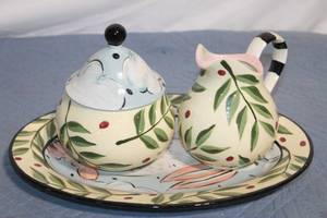 lot 438 image: Hand-Painted Ceramic Sugar and Creamer Set with Rabbit Plate