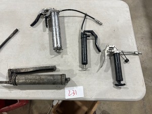 4 GREASE GUNS 2 SMALL, & 2 REGULAR SIZE