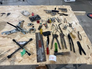 TABLE FULL OF HAND TOOLS