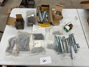 TABLE FULL OF VARIOUS HARDWARE