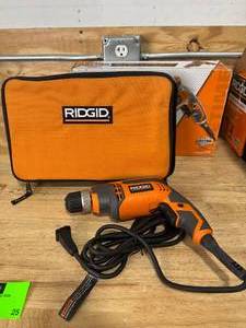 lot 25 image: RIDGID R70011 8 Amp 38 in. Corded DrillDriver - B60