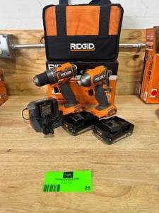 lot 26 image: RIDGID R97801 18V SubCompact Brushless 2-Tool Combo Kit with DrillDriver, Impact Driver, (2) 2.0 Ah Batteries, Charger, and Tool Bag - C199