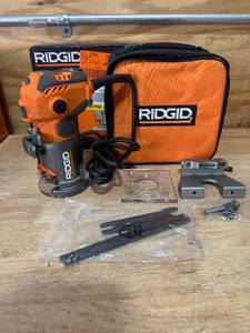lot 27 image: RIDGID R24012 5.5 Amp Compact Fixed-Base Corded Router - C139