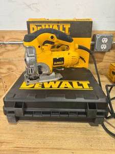 lot 29 image: DEWALT DW331K 6.5 Amp Corded Variable Speed Jig Saw Kit - C159