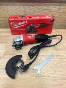 lot 8 image: MILWAUKEE 6130-33 7 Amp Corded 4-12 in. Small Angle Grinder with Sliding Lock-On Switch - D79