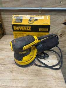 lot 49 image: DEWALT DWE6423 3 Amp Corded 5 in. Variable Speed Random Orbital Sander - C84