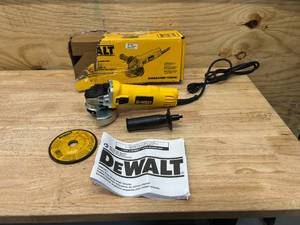 lot 56 image: DEWALT 7 DWE4011 Amp 4.5 in. Small Corded Angle Grinder with 1-Touch Guard - B79