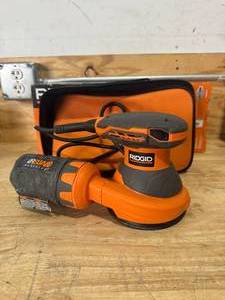 lot 96 image: RIDGID R26011 3 Amp Corded 5 in. Random Orbital Sander with AIRGUARD Technology - C65