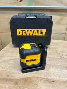 lot 40 image: DEWALT DW08802CG 55 ft. Green Self-Leveling Cross Line Laser Level with Case - C97.02