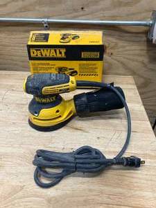 lot 69 image: DEWALT DWE6423 3 Amp Corded 5 in. Variable Speed Random Orbital Sander - C84