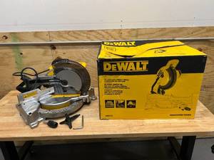 lot 114 image: DEWALT DWS713 15 Amp Corded 10 in. Compound Single Bevel Miter Saw - D249