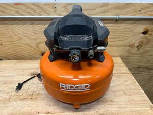 lot 127 image: RIDGID RDGD 6 gal. 150 PSI Portable Electric Pancake Air Compressor - C99
