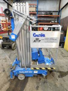 lot 25 image: 1996 Genie Push Around AWP-25S Man Lift - For Parts or Repair