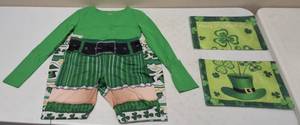 lot 11 image: St Patricks Day Gear (1) Green Stretchy Top - Size M (1) St Patricks Themed Stretchy Pants (2) St Patrick Day Banners