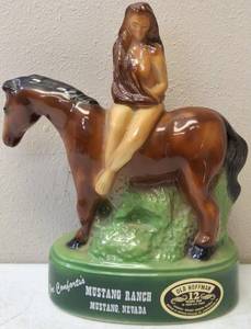 lot 42 image: Mustang Ranch - Old Hoffman 12 Years Old Liquor Bottle - Empty