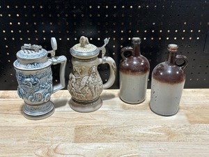 lot 31 image: Vintage Molasses or. Sorghum Syrup Jugs. And Beer Seins