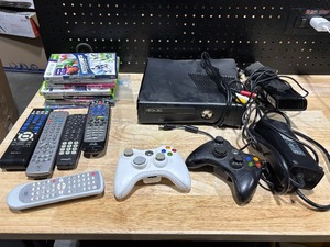 lot 37 image: XBox Player, Games and Assorted Remotes