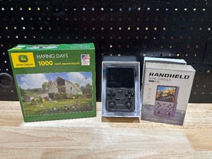 lot 41 image: Puzzle and Handheld Game Console