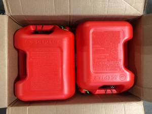 lot 12 image: Lot of Gas Gallons  Customer Returns See Pictures