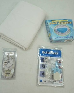 lot 58 image: button sewer & sheet snugglers and straps