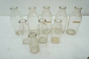 lot 94 image: antique milk bottles