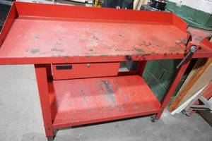 lot 108 image: Clarke work bench with vice and wheels on one side