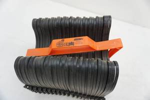 lot 119 image: Camco Sidewinder plastic sewer hose support