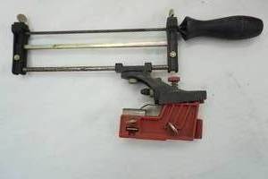 lot 122 image: Oregon sure sharp clamp on chainsaw sharpener