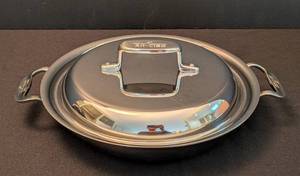lot 29 image: All Clad Double Handled Stainless Steel Pan with Lid