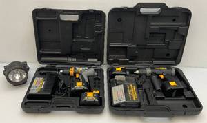 lot 153 image: Two Panasonic 15.6 Volt Cordless Drills With Batteries, Chargers And Carrying Cases (Both Work)