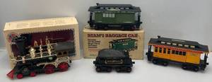 lot 189 image: Misc. Vintage Jim Beam Train Decanter Items Including Turner Engine, Coal, Baggage, Combination Car (Some In Original Boxes)