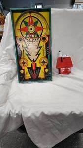 lot 44 image: Vintage Rocket Shot and Snoopy Bank