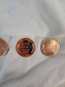 lot 123 image: 4-APMEX 1 oz Copper Wheat Round Coins