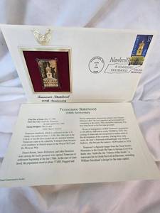 lot 127 image: Tennessee 24KT Gold Boullion Stamp