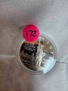 lot 172 image: 1986 Ellis Island Liberty Dollars, 1 oz Silver