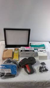 Office Supplies Collection with Labeler, Binder Clips, and Coffee Stirrers