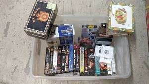 Collection of VHS Tapes and Ratchet Straps Set