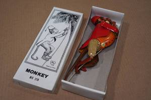 lot 171 image: Vintage Look Tin Litho Climbing Monkey
