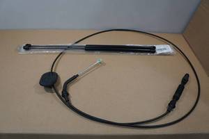 lot 33 image: Rear Window Shock Gas Springs with Transmission Gear Shift Cable