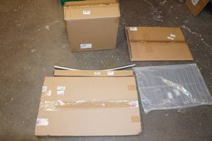 lot 38 image: Assorted Appliance Replacement Part -Fridge Glass Shelf, Drawer, Handles, Racks for Oven
