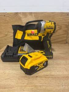 lot 109 image: DEWALT DCF850P1 ATOMIC 20V MAX Lithium-Ion Cordless 14 in. Brushless Impact Driver Kit, 5 Ah Battery, Charger, and Bag - C219