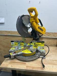 lot 134 image: DEWALT DWS716 15 Amp Corded 12 in. Compound Double Bevel Miter Saw - C399