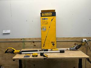 lot 159 image: DEWALT DCPS620M1 20V MAX 8in. Brushless Cordless Battery Powered Pole Saw Kit with (1) 4 Ah Battery & Charger - C235.40