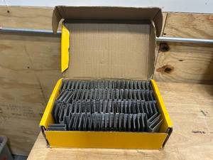 lot 49 image: DEWALT DWCS1516 2 in. Leg x 12 in. Crown 15-12-Gauge Coated Steel Hardwood Flooring Staple (7,728 per Box) - B99.98
