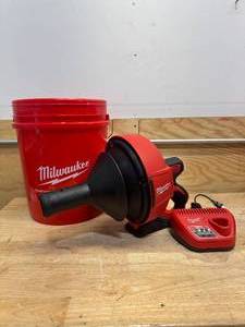 lot 73 image: MILWAUKEE 2571-21 M12 12-V Lithium-Ion Cordless Drain Snake Auger W (1) 1.5Ah Battery, 516 in. x 25 ft. Cable, Charger, & 5 Gal. Bucket - B269