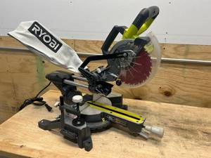 lot 209 image: RYOBI TSS702 10 Amp Corded 7-14 in. Compound Sliding Miter Saw C219
