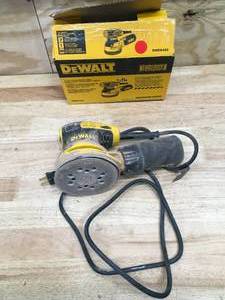 lot 13 image: DEWALT DWE6423 3 Amp Corded 5 in. Variable Speed Random Orbital Sander - C84