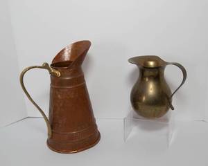 lot 25 image: Two Decorative Metal Pitchers  Brass & Copper-Toned