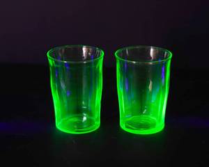 lot 67 image: Two Uranium Glass Juice Cups